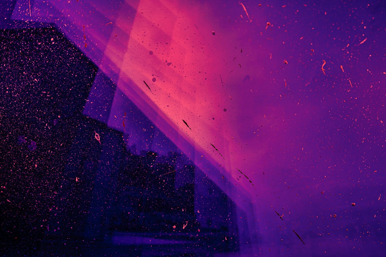 Particules de lumière rose et violette